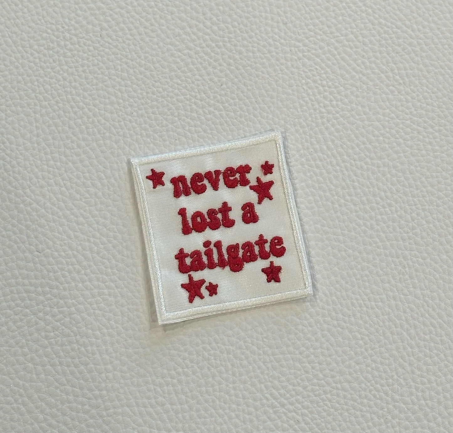 “Never lost a tailgate” embroidered patch